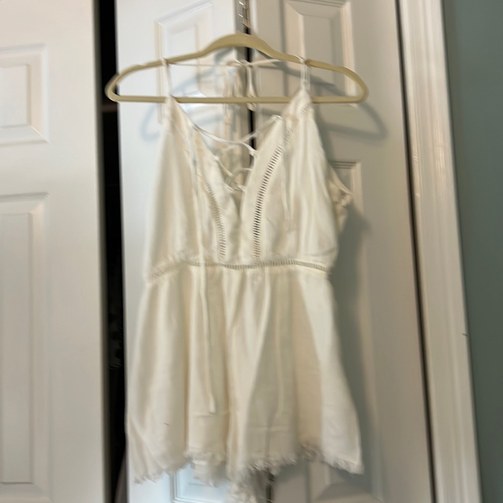 One piece shorts and tie front spaghetti strap top